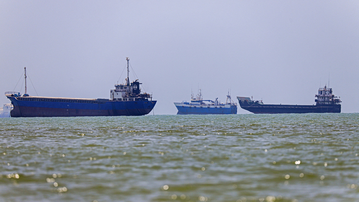 In this picture obtained from Iran's ISNA news agency on June 18, 2026, vessels are seen anchored in Bandar Abbas along the Strait of Hormuz. The Strait of Hormuz is expected to fully reopen but two months of negotiations lie ahead.