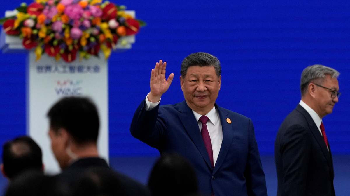 Chinese President Xi Jinping waves as he arrives at the opening ceremony for the World AI Conference in Shanghai, China, July 17, 2026.     Ng Han Guan/Pool via REUTERS
