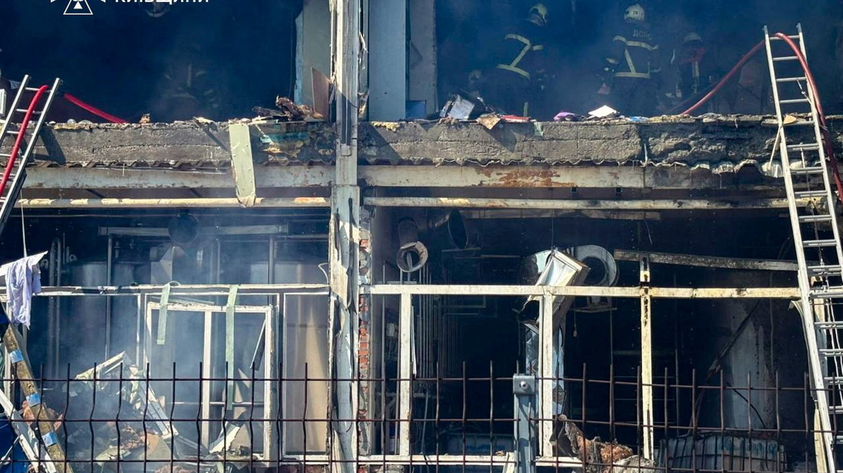 Rescuers work at a site of a dairy plant hit by a Russian drone strike, amid Russia's attack on Ukraine, in Kyiv region, Ukraine in this handout picture released June 5, 2026. Press service of the State Emergency Service of Ukraine in Kyiv region/Handout via REUTERS