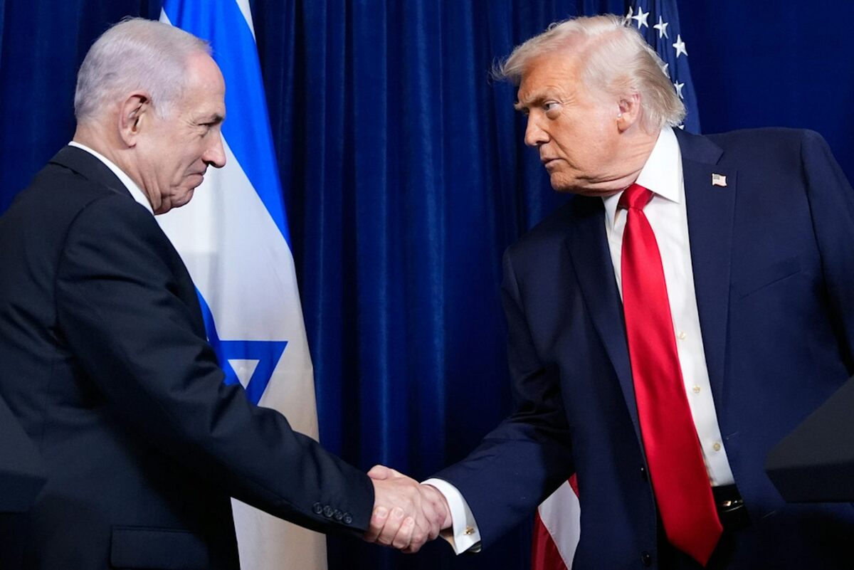  President Donald Trump shakes hands with Israeli Prime Minister Benjamin Netanyahu during a news conference at Mar-a-Lago in late 2025. AP Photo/Alex Brandon 