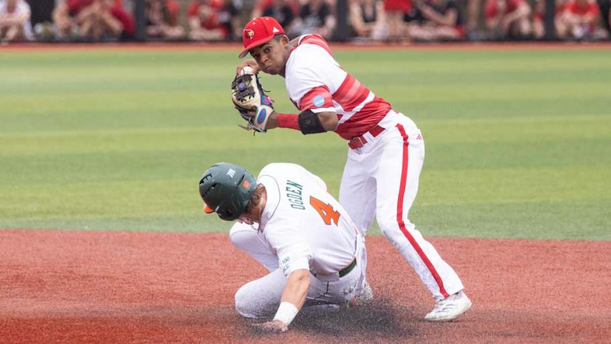  Louisville infielder Kamau Neighbors beats Miami infielder Jake Ogden and turns the double play to first during the NCAA baseball Super Regional game 2 at Jim Patterson Stadium on June 7, 2025 in Louisville, Ky. | Michelle Hutchins/Special to the Courier Journal / USA TODAY NETWORK via Imagn Images 