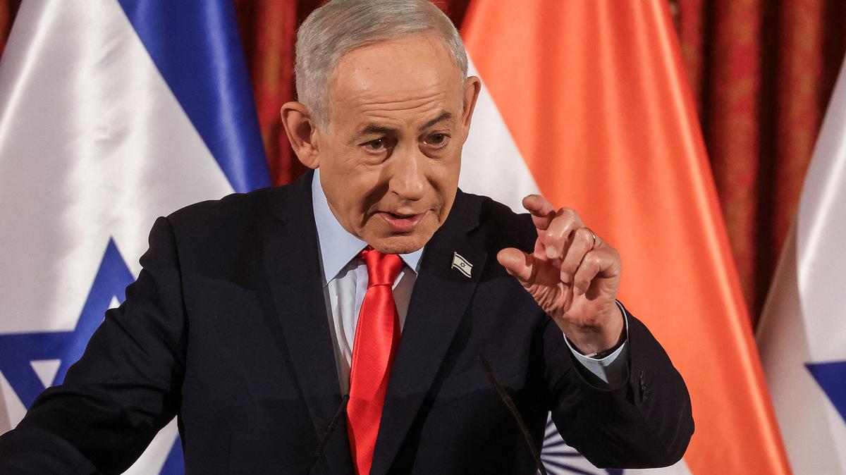 Israel's Prime Minister Benjamin Netanyahu speaks during a joint news conference with his Indian counterpart Narendra Modi in Jerusalem on Feb. 26, 2026. Israel will intensify its strikes against Hezbollah, Netanyahu said Monday, May 25, 2026, amid stepped-up negotiations between the U.S. and Iran to bring an end to conflict in the region. (Gil Cohen-Magen/Pool/AFP/Getty Images/TNS)
