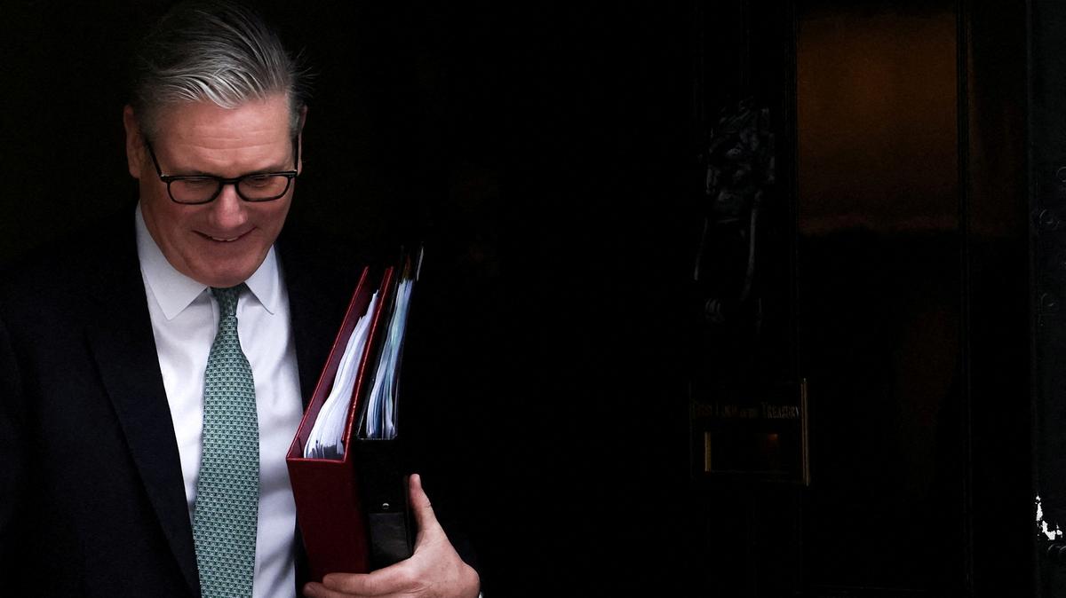 FILE PHOTO: British Prime Minister Keir Starmer leaves 10 Downing Street in London, Britain, February 11, 2026. REUTERS/Toby Melville/File Photo