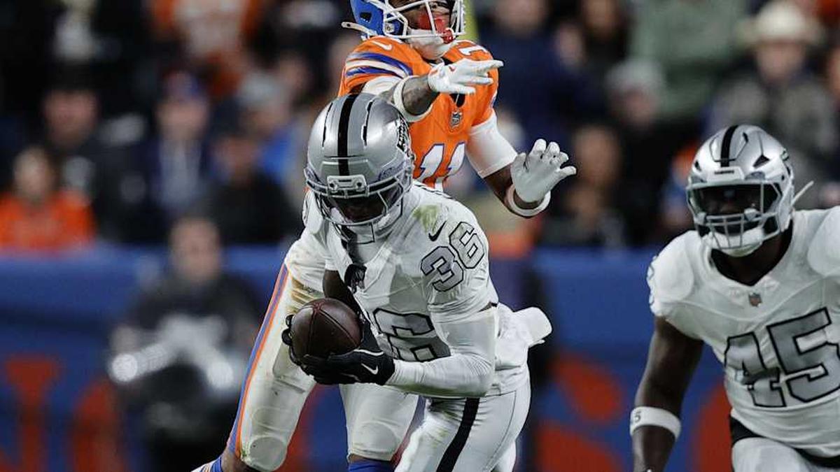  Nov 6, 2025; Denver, Colorado, USA; Las Vegas Raiders cornerback Kyu Blu Kelly (36) makes an interception against the Denver Broncos during the second half at Empower Field at Mile High. Mandatory Credit: Isaiah J. Downing-Imagn Images | Isaiah J. Downing-Imagn Images 