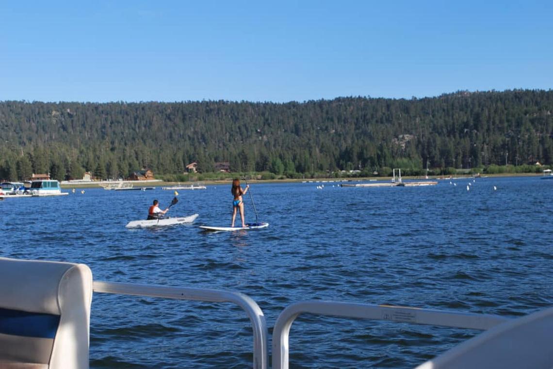 Boating, stand-up paddling, and fishing are among summer activities in Big Bear Lake, CA. Photo credit: Mimi Slawoff 