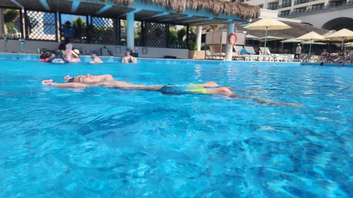  The family pool has plenty of space to move around, with a large bar area to accommodate many guests. Photo credit: Kimberly Miles 