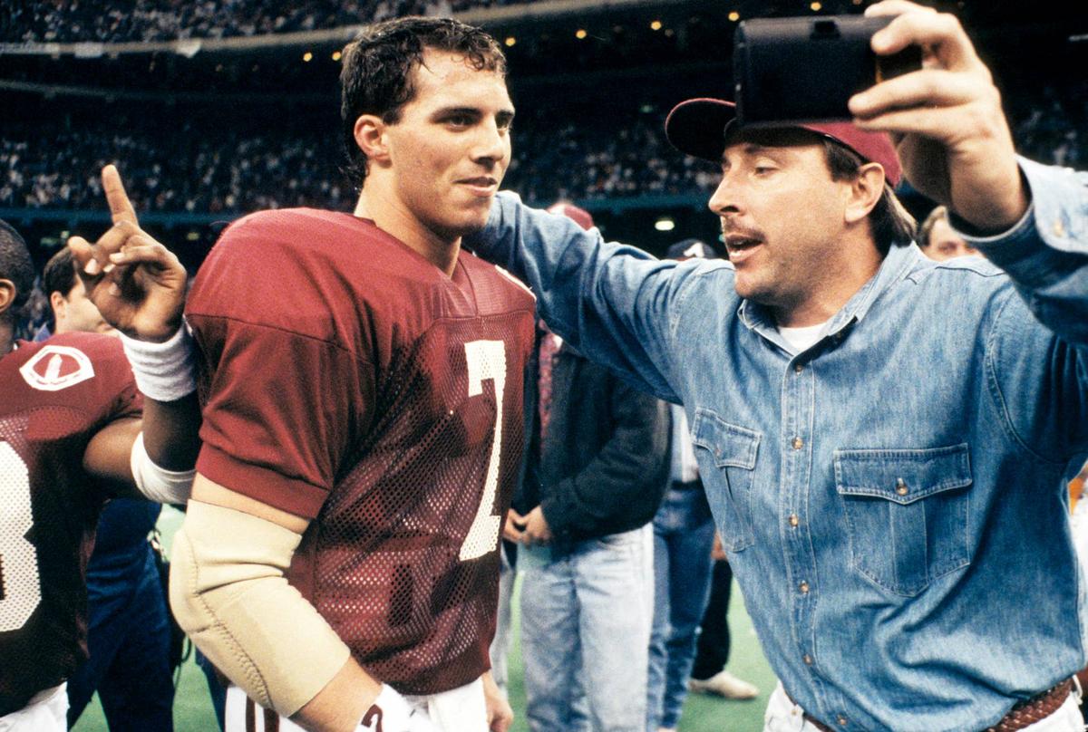  Alabama Crimson Tide quarterback Jay Barker taking a picture with a fan after defeating the Miami Hurricanes in the 1993 Sugar Bowl at the Superdome. RVR Photos-USA TODAY Sports