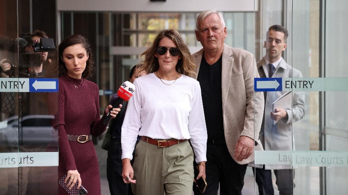 Sall Grover, founder of female-only social networking platform Giggle for Girls, leaves court after the Federal Court upheld a ruling that the exclusion of transgender woman Roxanne Tickle from the app was discriminatory, in Sydney, Australia, May 15, 2026. REUTERS/Hollie Adams