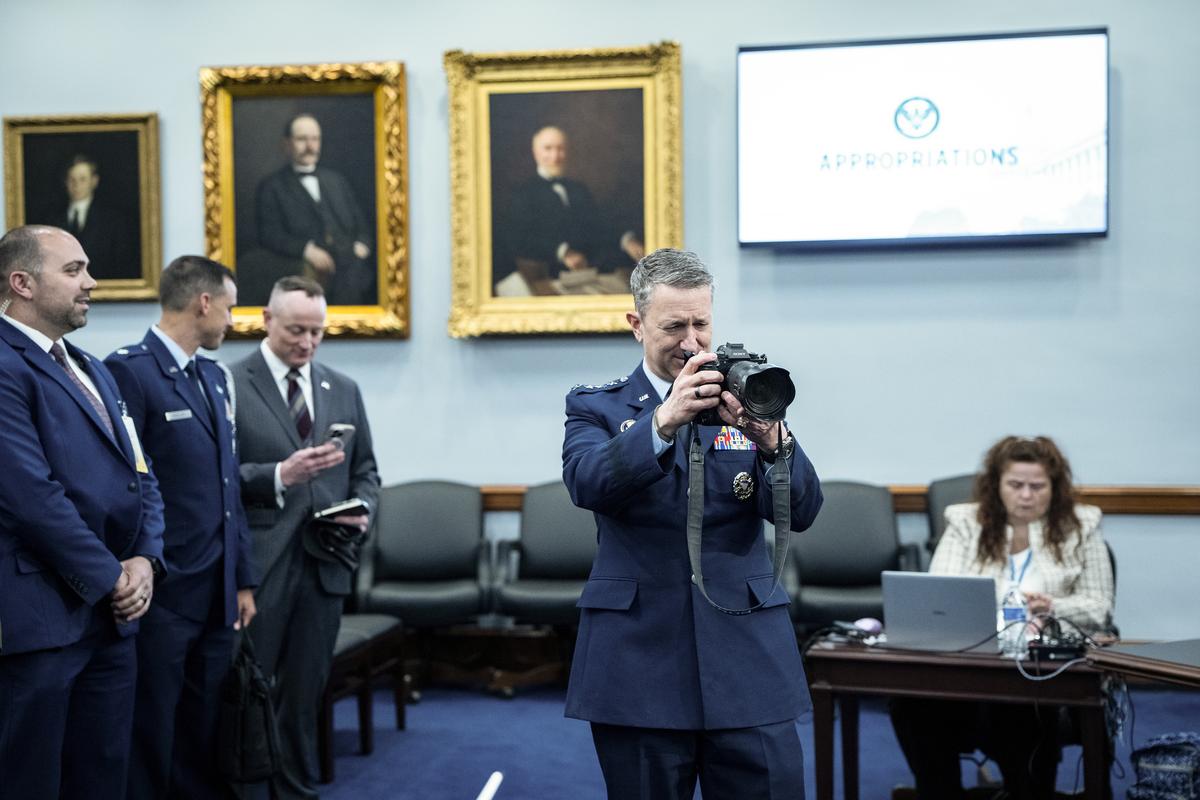 Gen. Dan Caine, the chairman of the Joint Chiefs of Staff, photographs visual journalists before a hearing on the Department of Defense budget request before the House Appropriations subcommittee on Defense in Washington, on Tuesday, May 12, 2026. (Haiyun Jiang/The New York Times)