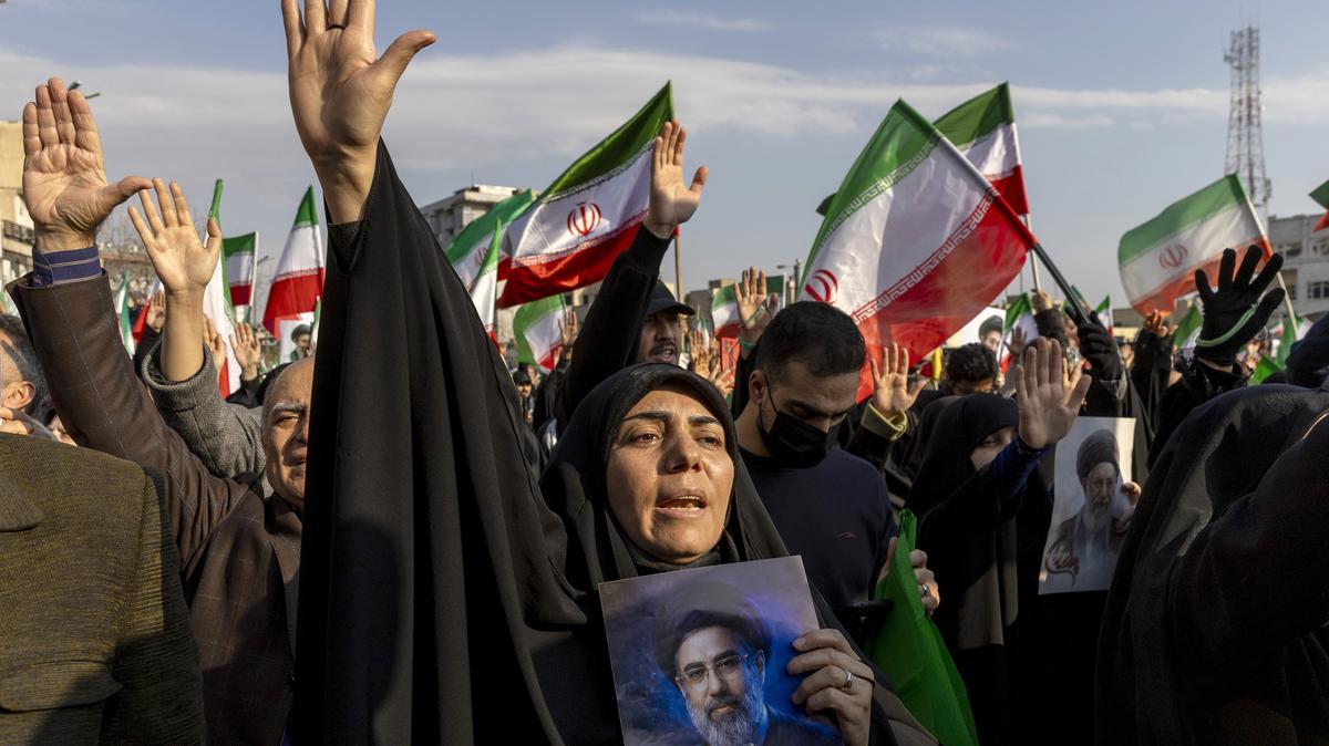 A woman holds a picture of Iran's new Supreme Leader Ayatollah Mojtaba Khamenei during a rally in support of the new Supreme Leader at Enghelab Square on March 9, 2026, in Tehran, Iran. The United States and Israel continued their joint attack on Iran that began on February 28. Iran retaliated by firing waves of missiles and drones at Israel, and targeting U.S. allies in the region.