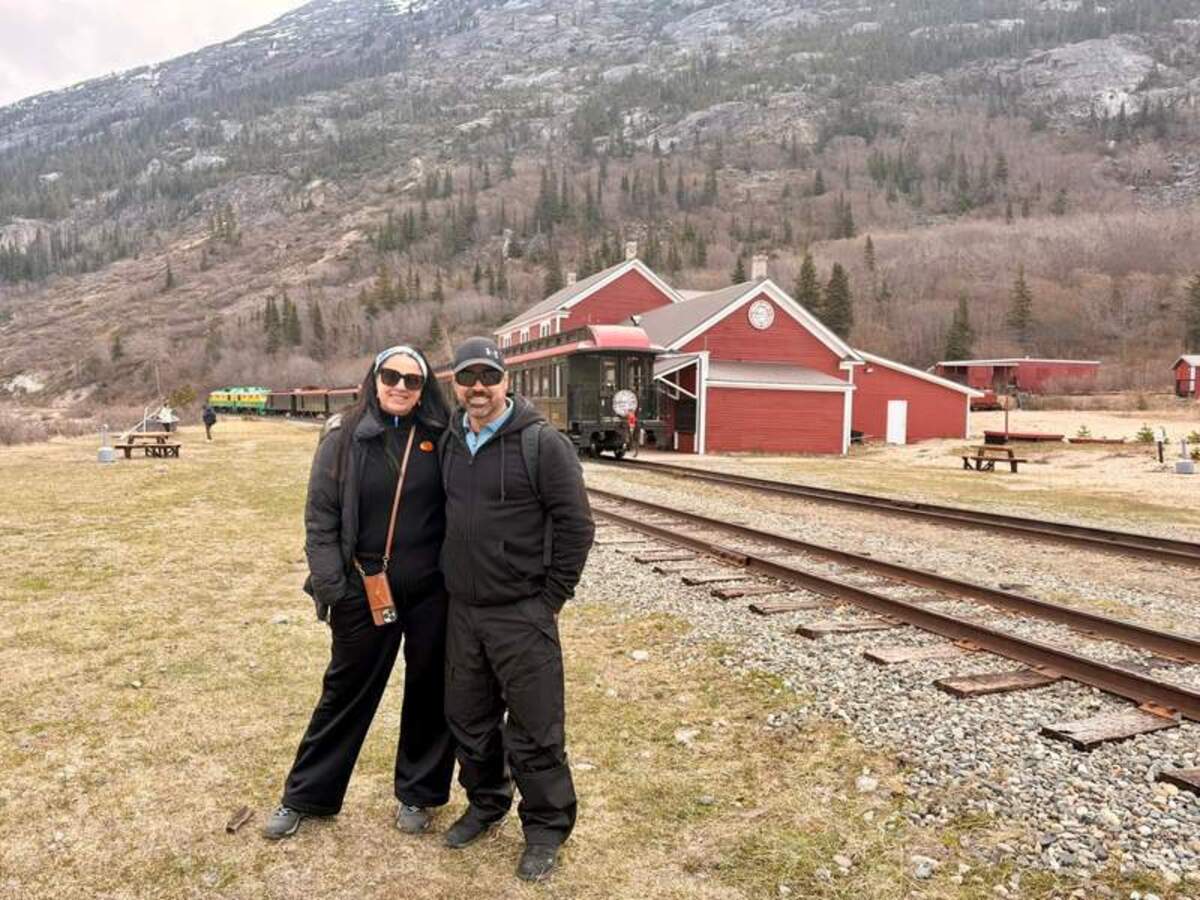  A memorable stop in Bennett, British Columbia, where we posed in front of the historic train depot and White Pass & Yukon Route Railroad train. Photo credit: Emily Molina 