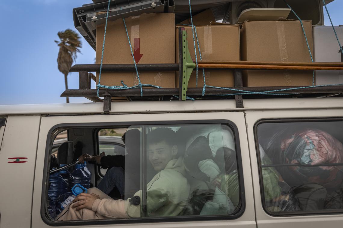 A Lebanese family returning south on the Beirut to Sidon coastal highway, on the second day of the ceasefire, Saturday, April 18, 2026. Prime Minister Benjamin Netanyahu said Israeli troops would remain inside Lebanon, as part of what he called an "expanded security zone" from Lebanon's Mediterranean coast to its border with Syria, south of the Litani River. (Diego Ibarra Sánchez/The New York Times)