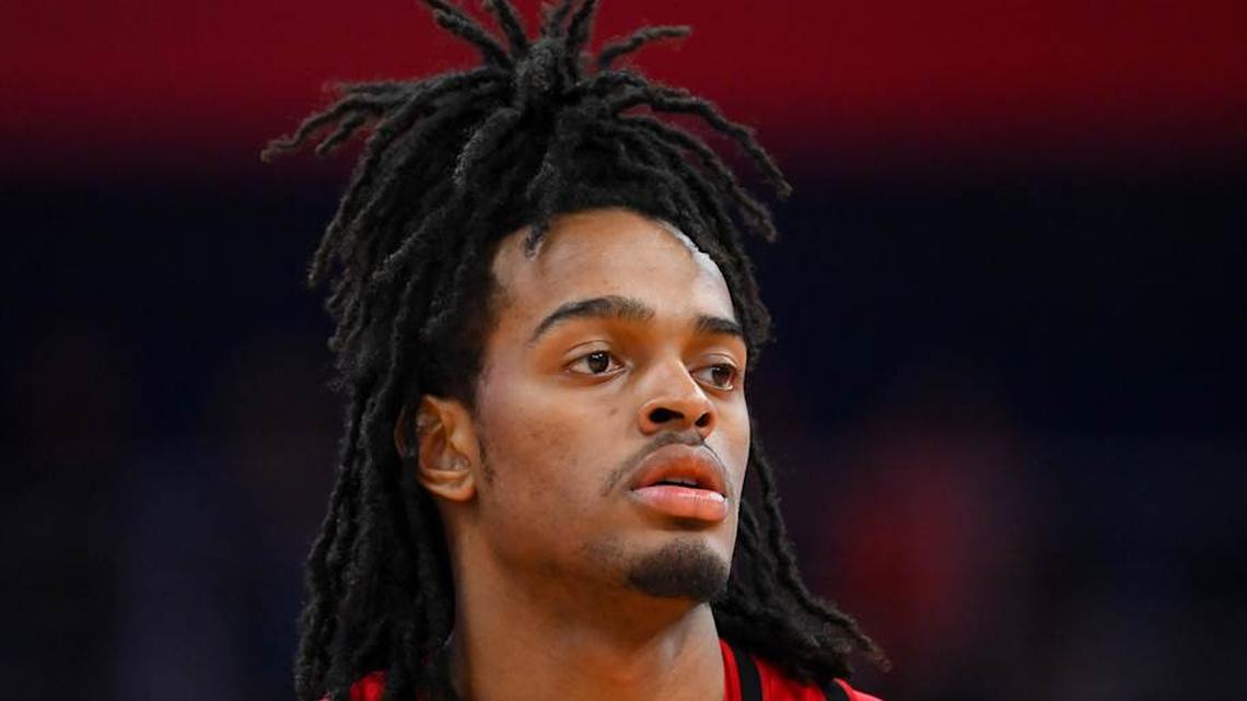  Feb 26, 2025; Syracuse, New York, USA; North Carolina State Wolfpack guard Dennis Parker Jr. (11) looks on prior to the start of the second half against the Syracuse Orange at the JMA Wireless Dome. Mandatory Credit: Rich Barnes-Imagn Images | Rich Barnes-Imagn Images 