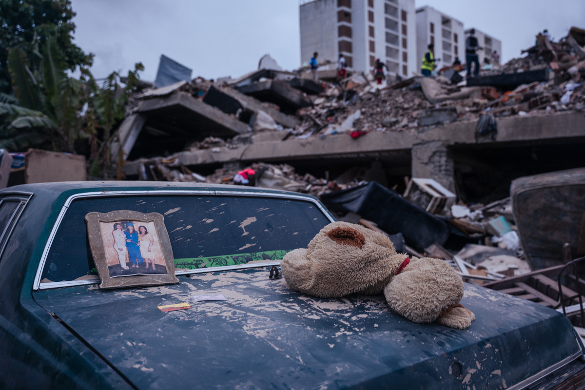 Belongings, recovered during search and rescue operations after an earthquake last week, rest on a damaged car in La Guaira , Venezuela, June 29, 2026. (Adriana Loureiro Fernandez/The New York Times)