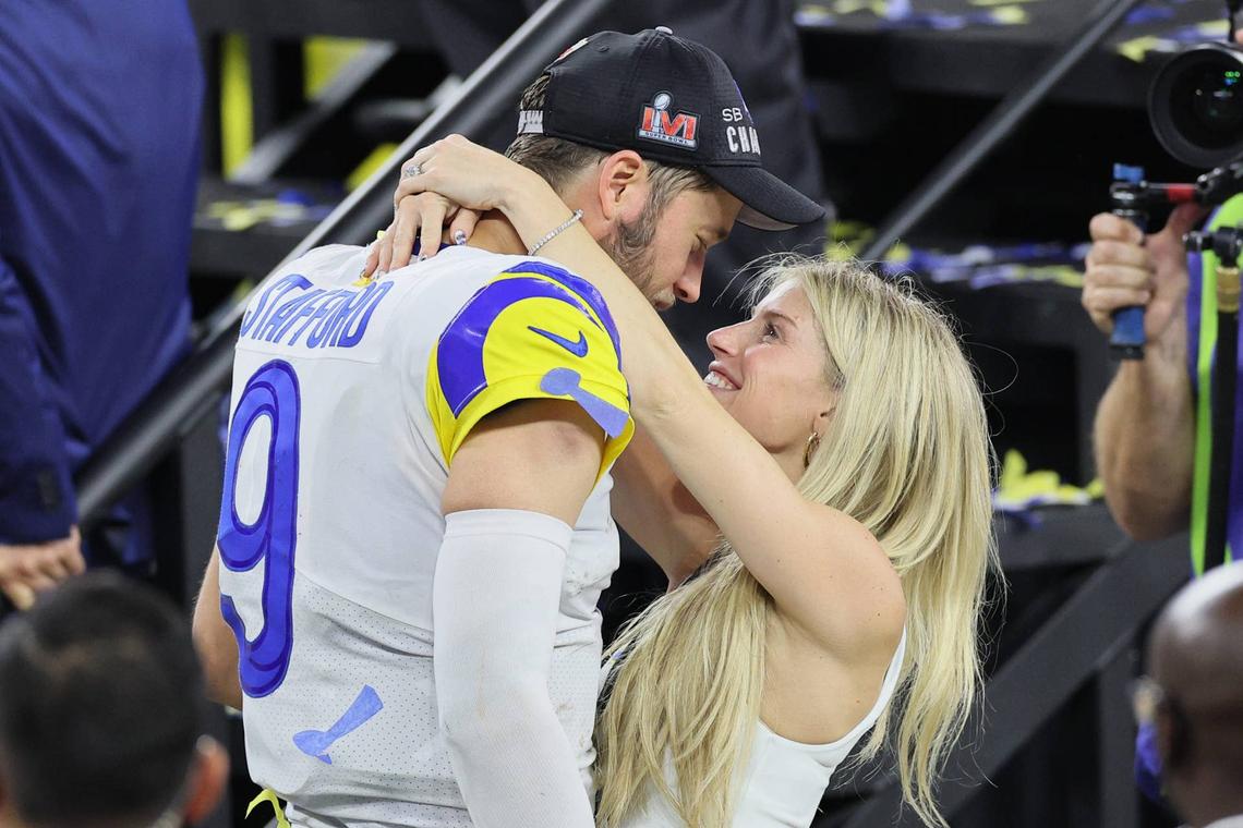  INGLEWOOD, CALIFORNIA - FEBRUARY 13: Matthew Stafford #9 of the Los Angeles Rams celebrates with his wife Kelly Stafford during Super Bowl LVI at SoFi Stadium on February 13, 2022 in Inglewood, California. The Los Angeles Rams defeated the Cincinnati Bengals 23-20. (Photo by Andy Lyons/Getty Images) 