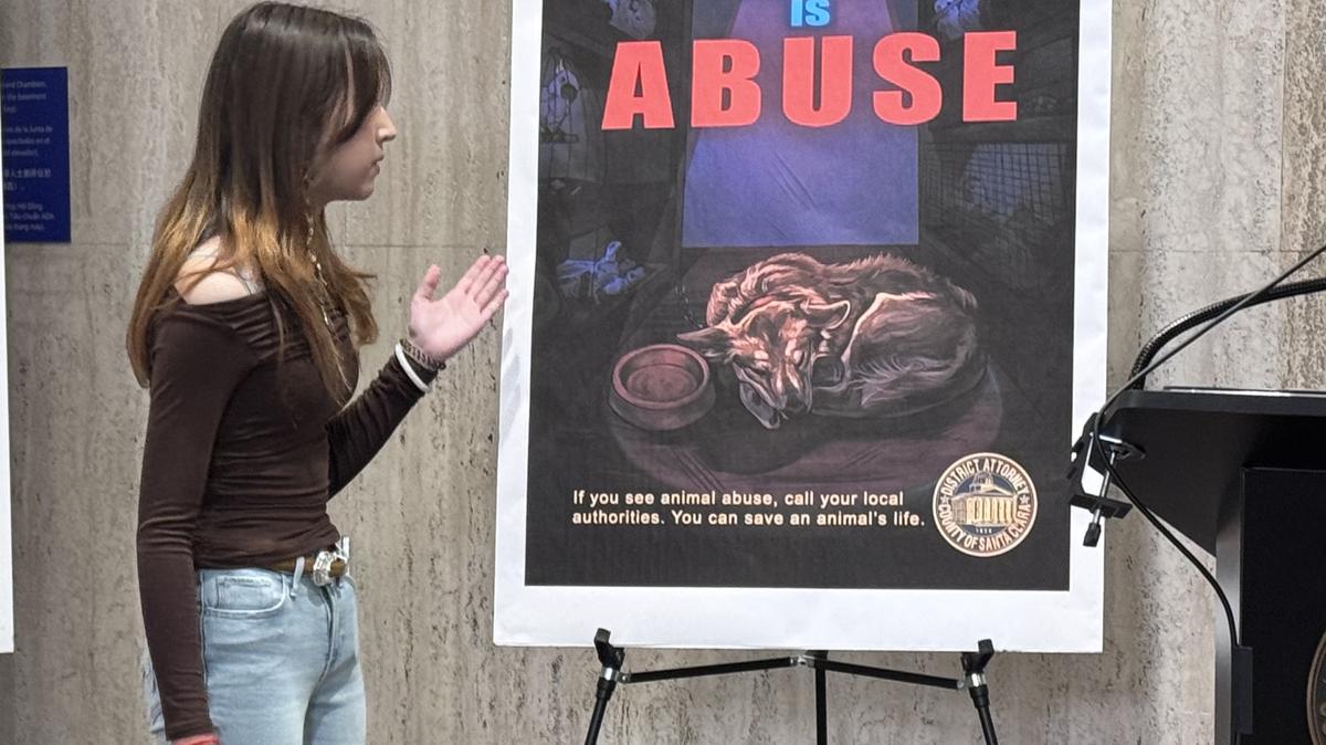First-place winner Anjelica Liljenstam of Leland High School in San Jose, talks about her artwork, which won first place in the Santa Clara County District Attorney’s Office’s  “Justice for All” art contest at the Santa Clara County Government Center on Friday, May 15, 2026. (Sal Pizarro/Bay Area News Group)
