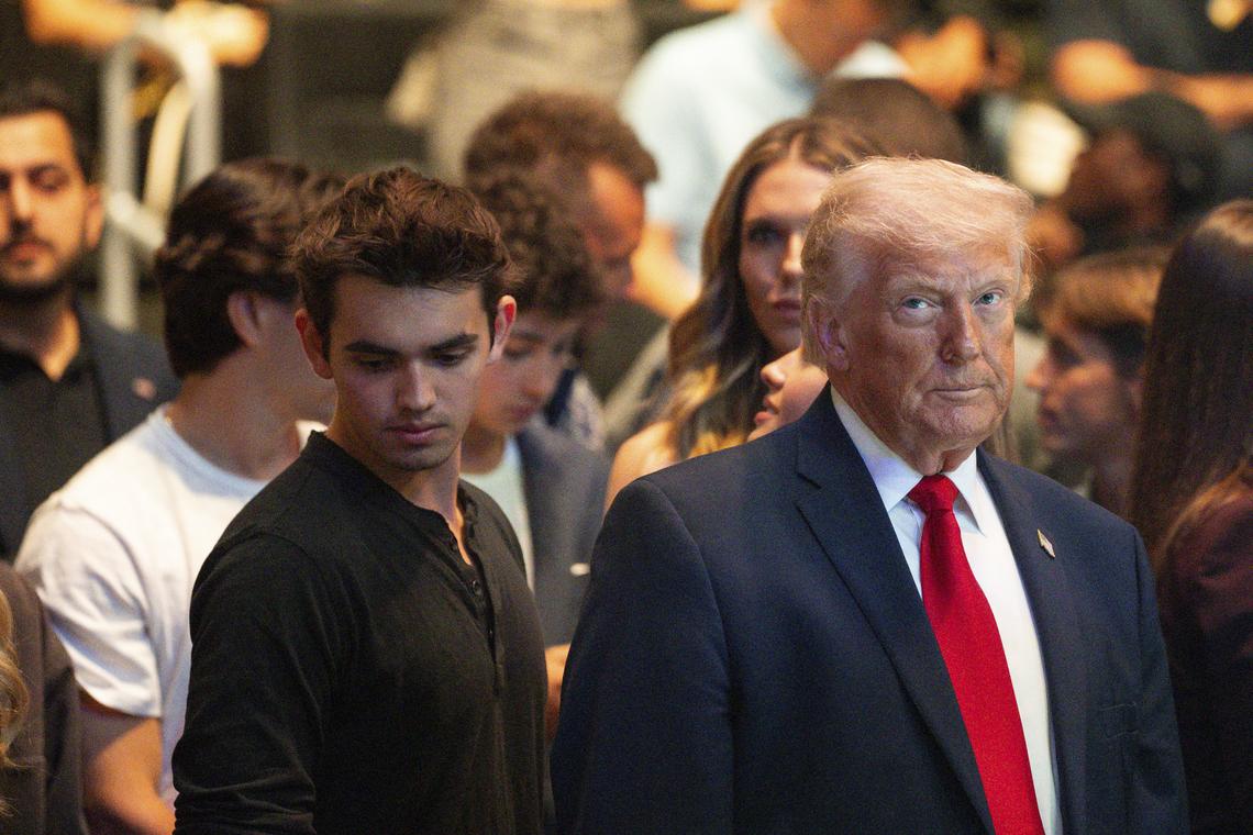 President Donald Trump attends a UFC event in Miami, April 11, 2026. Shortly after criticizing Pope Leo XIV in a lengthy social media post on Sunday, President Trump shared an apparently A.I.-generated image depicting him as a Jesus-like figure. (Tierney L. Cross/The New York Times)