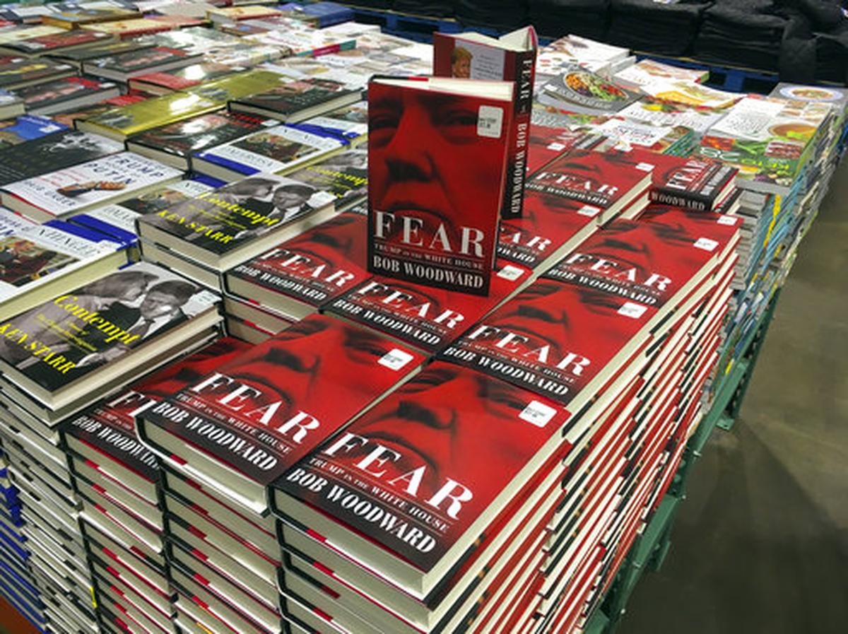 Copies of Bob Woodward’s “Fear” are seen for sale at Costco, Wednesday, Sept. 11, 2018 in Arlington, Va. It’s not clear whether President Donald Trump has much to fear from “Fear” itself. But the book of that name has set off a yes-no war between author Bob Woodward and the president, using all the assets they can muster.