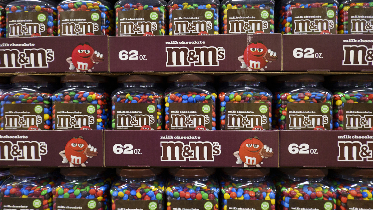 Packages of M&M's milk chocolate candy are stacked at a Costco Wholesale store on July 12, 2025 in San Diego, California. 