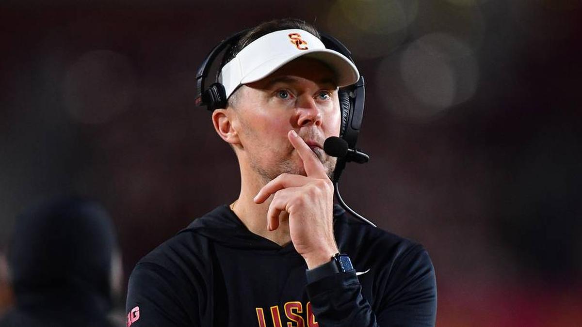  Nov 7, 2025; Los Angeles, California, USA; Southern California Trojans head coach Lincoln Riley watches game action against the Northwestern Wildcats during the second half at the Los Angeles Memorial Coliseum. Mandatory Credit: Gary A. Vasquez-Imagn Images | Gary A. Vasquez-Imagn Images 