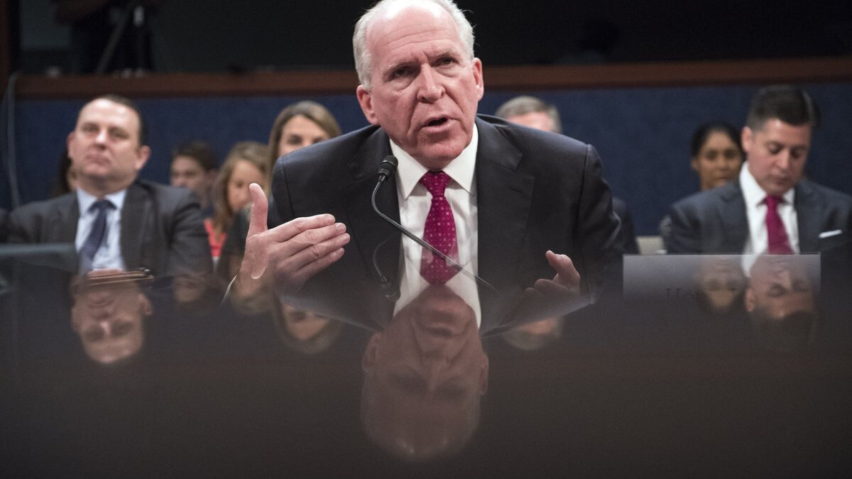 Former CIA Director John Brennan, shown in 2017, is suing the Trump administration, asking a judge to preserve all records of a Department of Justice investigation against him.