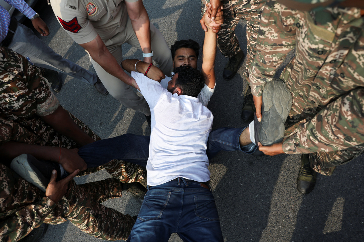 Indian police detain 'cockroach' movement leaders demanding election ...