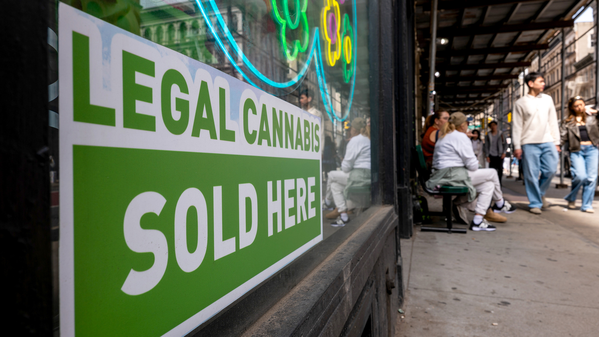 A cannabis dispensary stands in Manhattan on April 23, 2026, in New York City.  President Donald Trump’s acting attorney general, Todd Blanche, has signed an order that will reclassify state-licensed medical marijuana as a less dangerous drug. The move has long been sought by advocates for the legalization of marijuana.  (Spencer Platt/Getty Images/TNS)