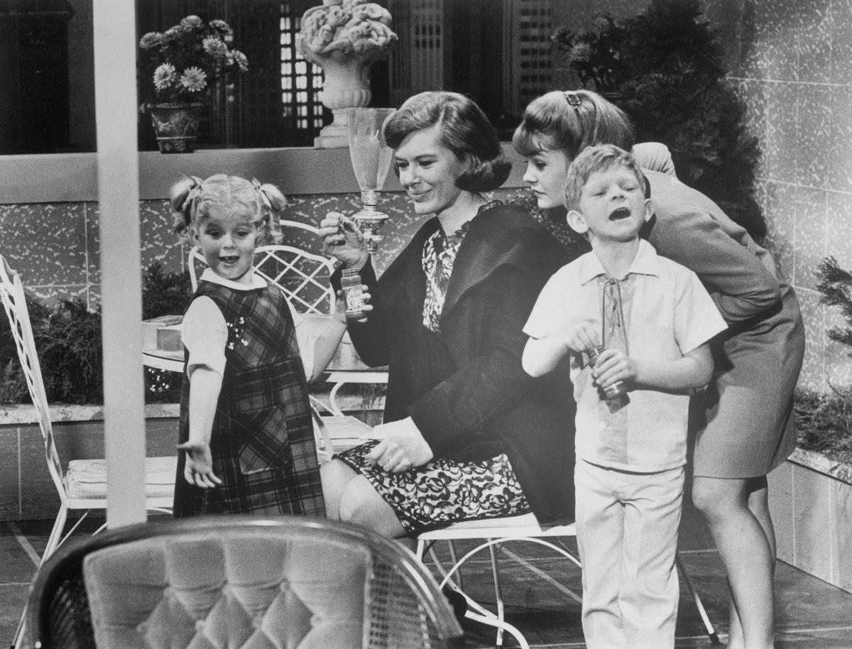 (Original Caption) Diane Brewster (second from left) tries to make friends with Anissa Jones, Kathy Garver, and Johnnie Whitaker (left to right) in a scene from the TV series, Family Affair. 1967.Bettmann Archives/Getty Images