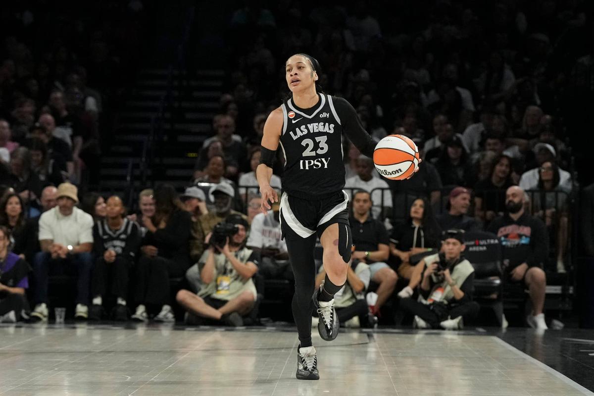 May 23, 2026; Las Vegas, Nevada, USA; Las Vegas Aces guard Chennedy Carter (23) dribbles against the Los Angeles Sparks in the first quarter of their game at Michelob Ultra Arena. Mandatory Credit: Candice Ward-Imagn Images 