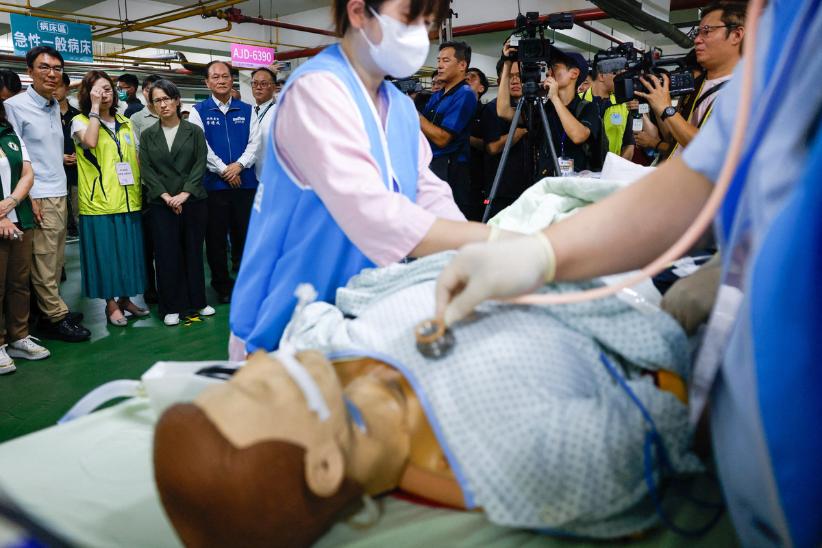 Taiwan Vice President Hsiao Bi-khim observes medical staff treating a simulated patient in an underground parking lot converted into a temporary medical ward during a resilience drill in Nantou, Taiwan, July 2, 2026. REUTERS/Ann Wang