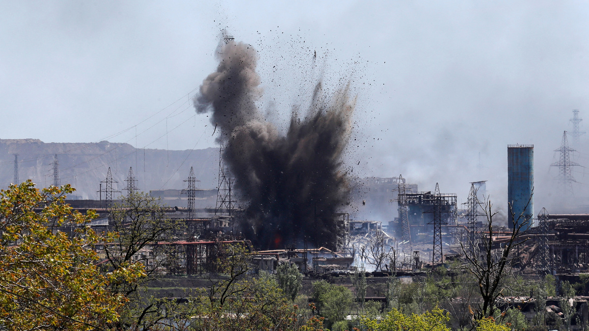 FILE PHOTO: A view shows an explosion at a plant of Azovstal Iron and Steel Works during Ukraine-Russia conflict in the southern port city of Mariupol, Ukraine May 11, 2022. REUTERS/Alexander Ermochenko/File Photo