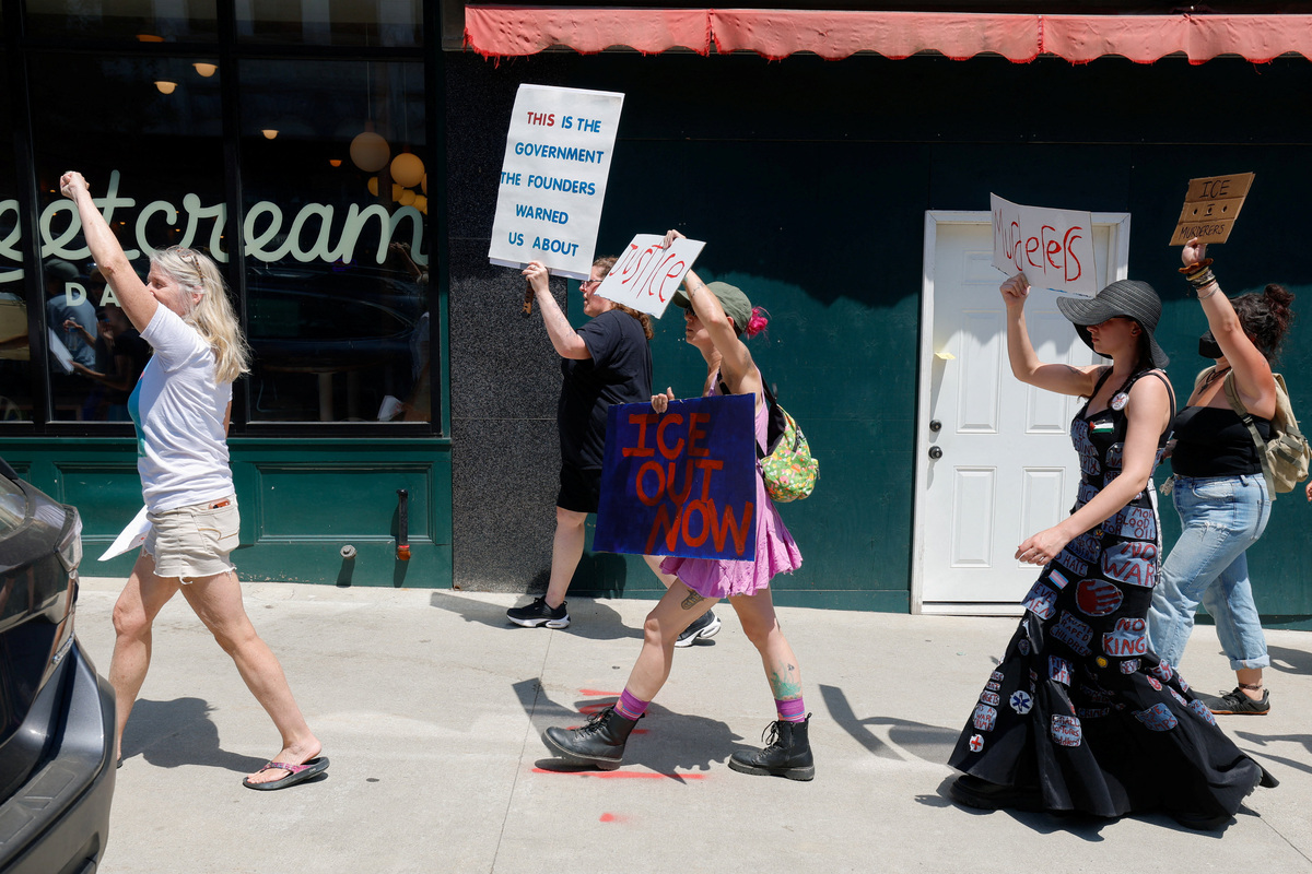 People take part in a protest after a shooting involving U.S. Immigration and Customs Enforcement (ICE) in Biddeford, Maine, U.S. July 13, 2026.  REUTERS/CJ Gunther