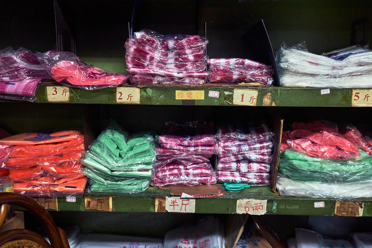 Various plastic bags for sale at Yu Chih-ta's shop, a shop that sells plastic bags and containers to small businesses, including food vendors, in New Taipei City, Taiwan on April 8, 2026. Plastic producers in Taiwan have scrambled to secure new supplies since the war in Iran disrupted petrochemical flows and tightened availability. (An Rong Xu/The New York Times)