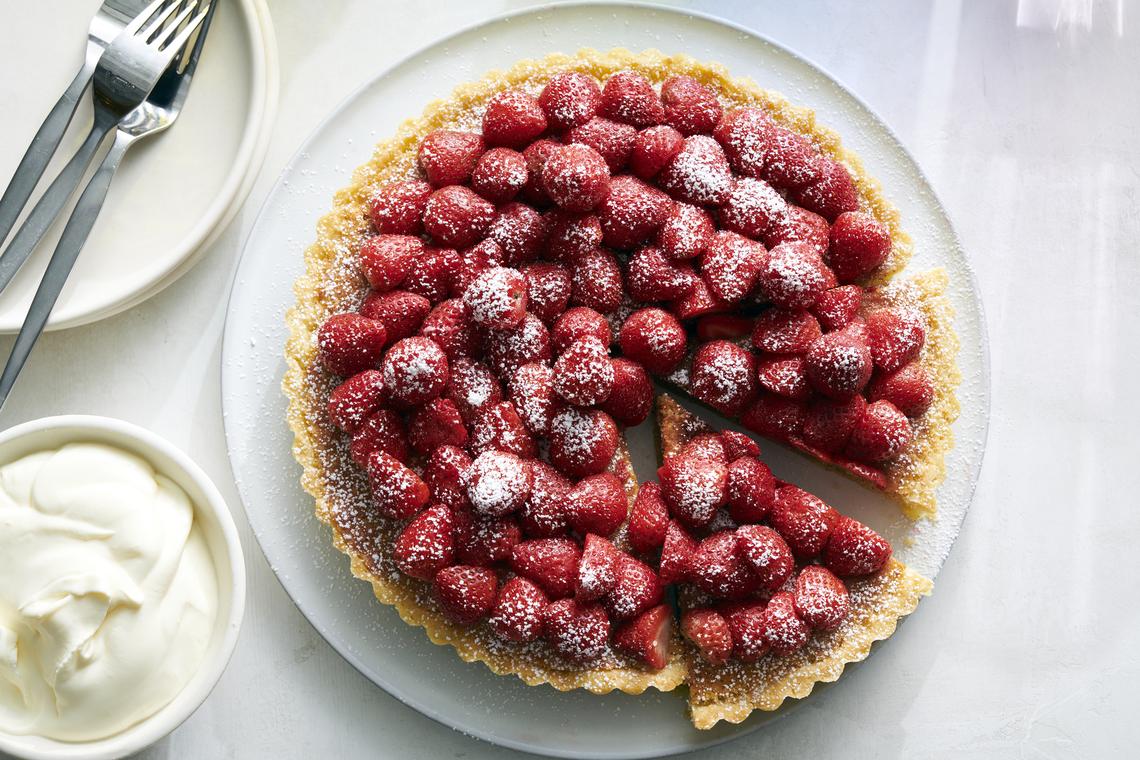 Fresh strawberry tart. Sweet, ripe strawberries are essential to top this almond tart. Food styled by Simon Andrews. (David Malosh/The New York Times)