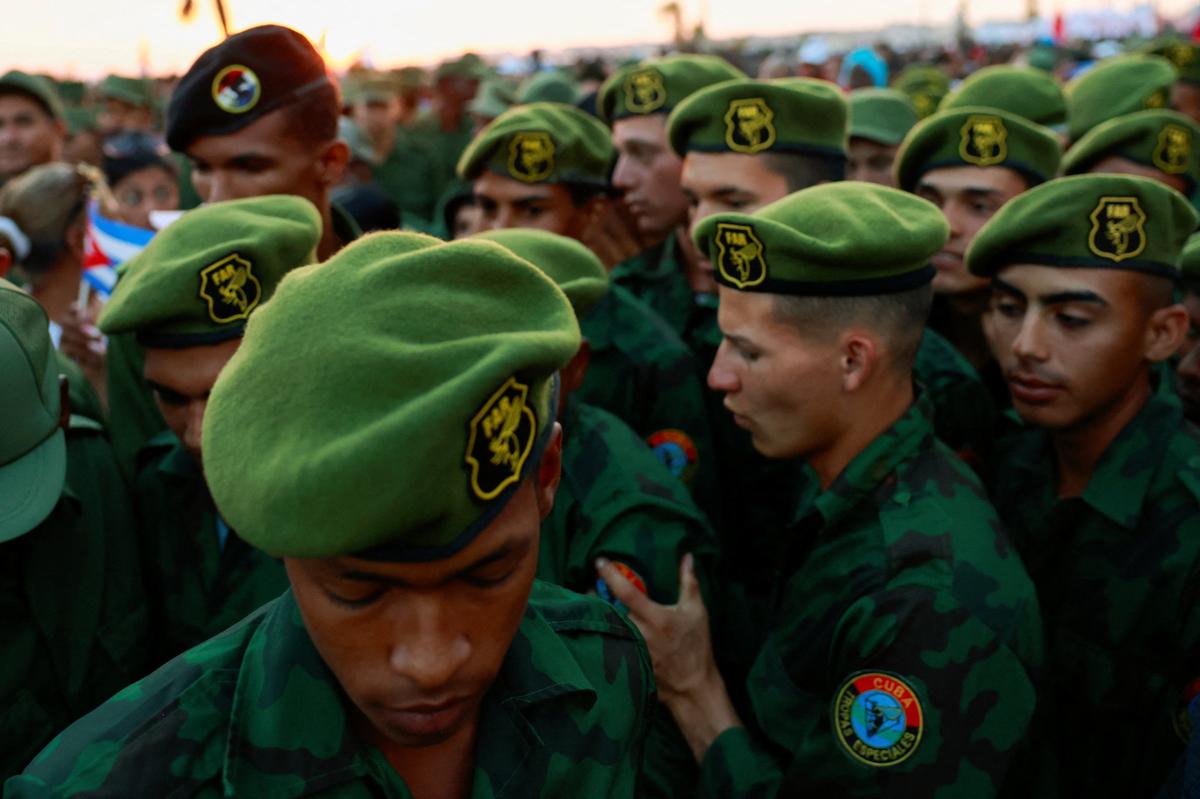 Members of the Revolutionary Armed Forces gather ahead of a pro-government rally called by Cuban authorities to protest U.S. policies toward the island, including the indictment of former Cuban president Raul Castro, in Havana, Cuba, May 22, 2026. REUTERS/Norlys Perez