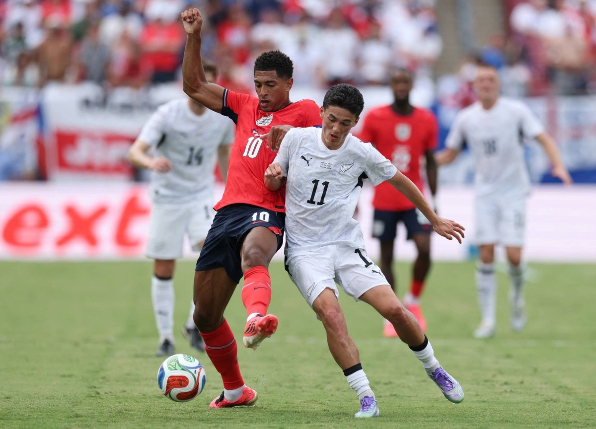  New Zealand's Elijah Just in action with England's Jude Bellingham. Nathan Ray Seebeck-Imagn Images