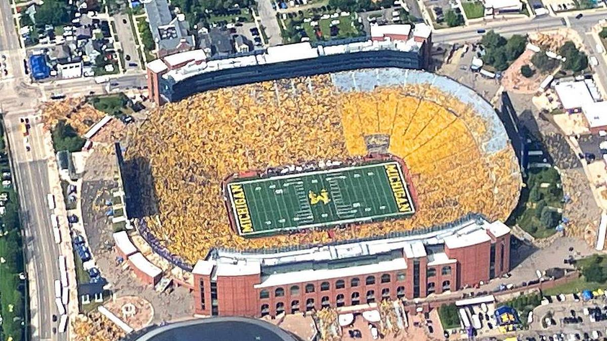  The Big House, home to the University of Michigan football team, had a maize out during the first home game of the 2023 season vs. East Carolina on Sept. 2, 2023. Photo was taken from a helicopter as the band played on the field shortly before kickoff. | Eric Seals / USA TODAY NETWORK via Imagn Images 
