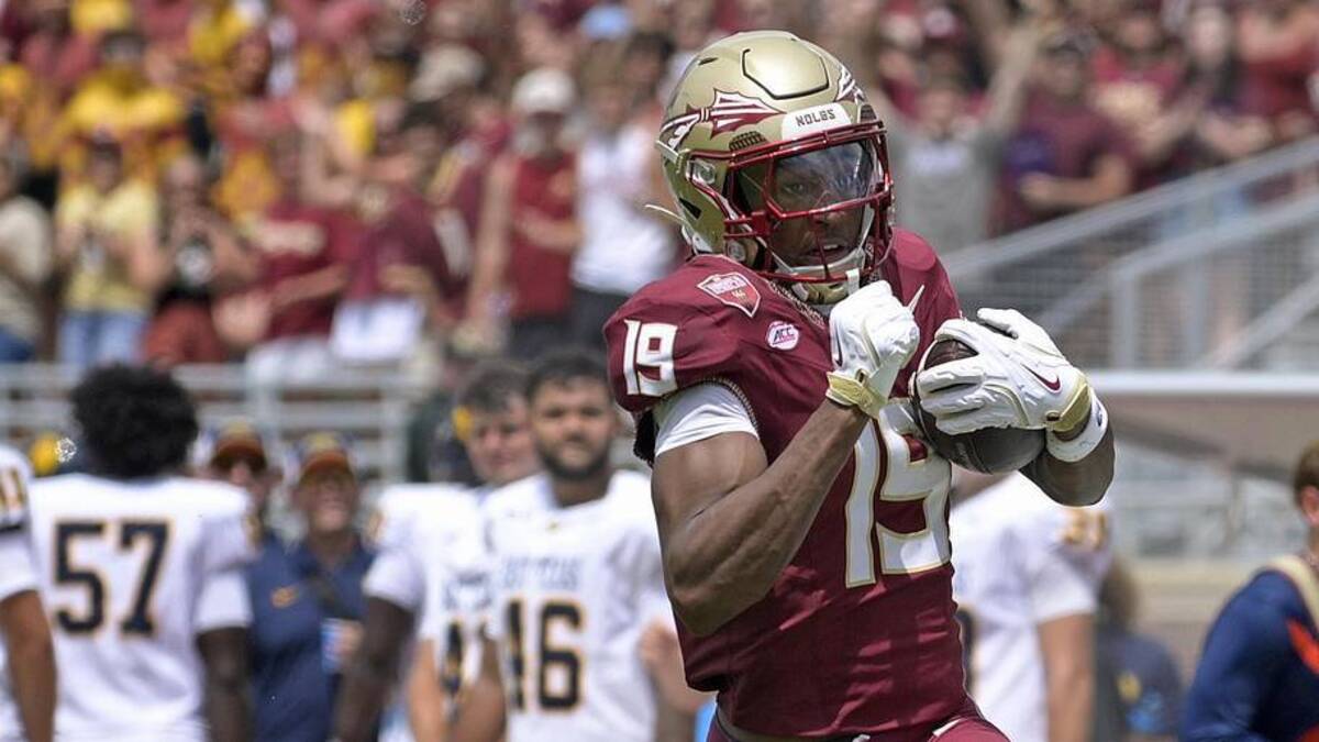  Sep 6, 2025; Tallahassee, Florida, USA; Florida State Seminoles wide receiver Micahi Danzy (19) runs the ball for a touchdown during the second half against the East Texas A&M Lions at Doak S. Campbell Stadium. Mandatory Credit: Melina Myers-Imagn Images | Melina Myers-Imagn Images 