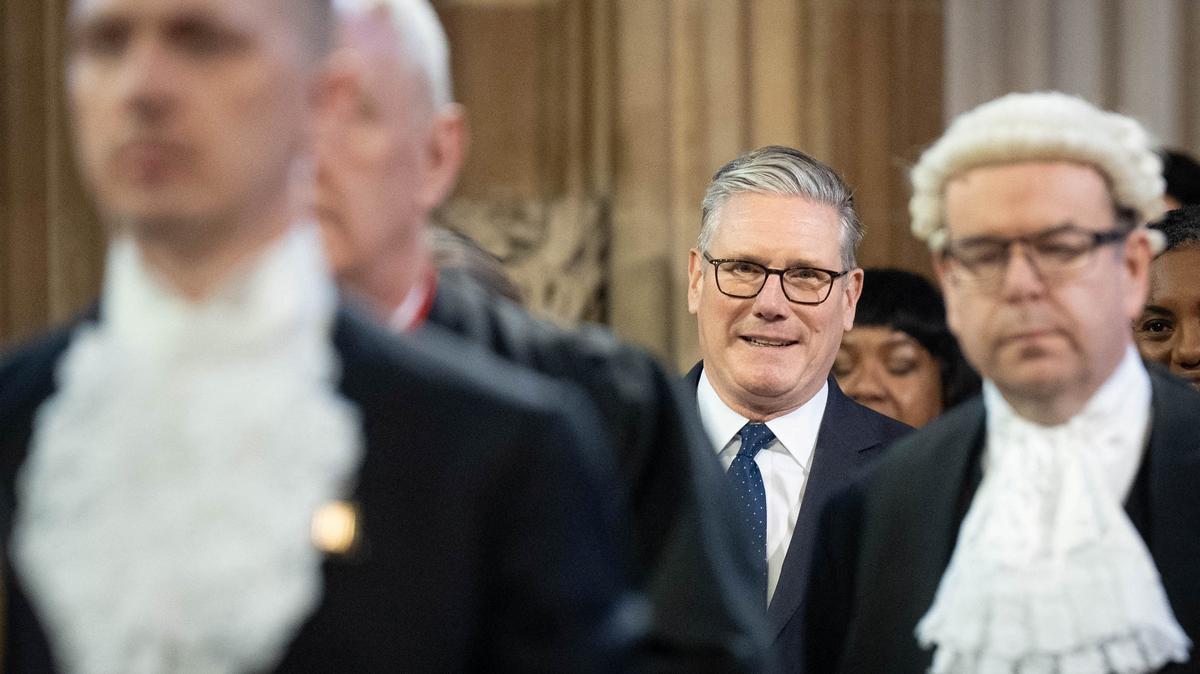 Britain's Prime minister, Keir Starmer walks through the Central Lobby of the Houses of Parliament in London to the House of Lords to hear the King's Speech during the State Opening of Parliament, in London, Britain May 13, 2026.    Stefan Rousseau/Pool via REUTERS