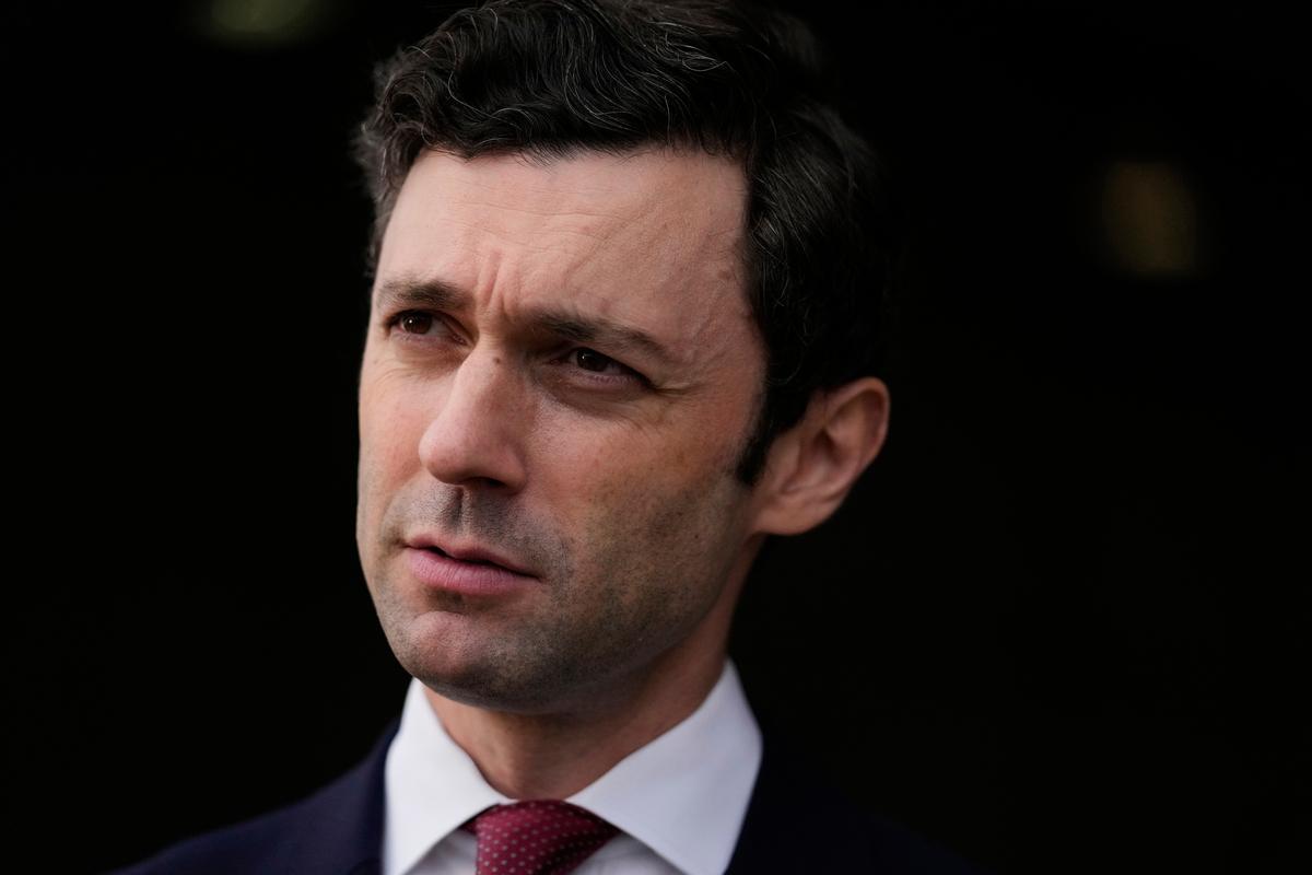  Senator Jon Ossoff listens during an interview at Dobbins Air Reserve Base in Marietta, Georgia, on April 26, 2025. 