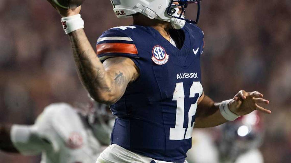  Auburn Tigers quarterback Ashton Daniels (12) throws the ball as Auburn Tigers take on Alabama Crimson Tide in the Iron Bowl at Jordan-Hare Stadium in Auburn, Ala. on Saturday, Nov. 29, 2025. Alabama Crimson Tide defeated Auburn Tigers 27-20. | Jake Crandall/ Advertiser / USA TODAY NETWORK via Imagn Images 