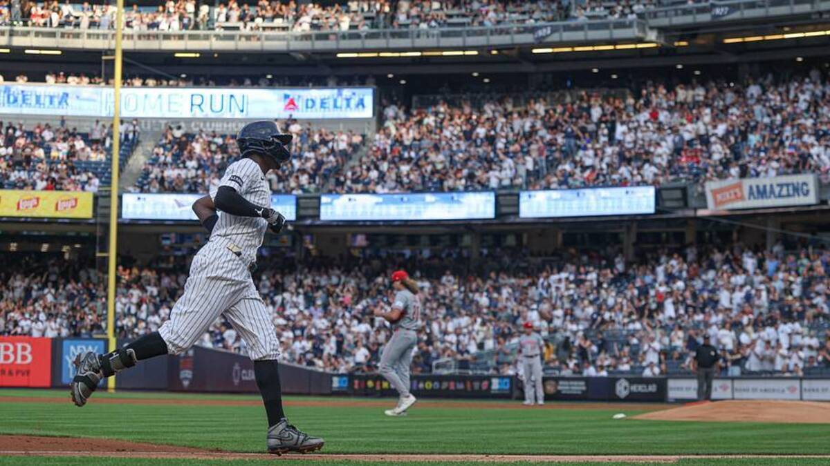  New York Yankees second baseman Jazz Chisholm Jr. (13) rounds the bases after hitting a solo home run during the second inning against the Cincinnati Reds at Yankee Stadium. | Vincent Carchietta-Imagn Images 