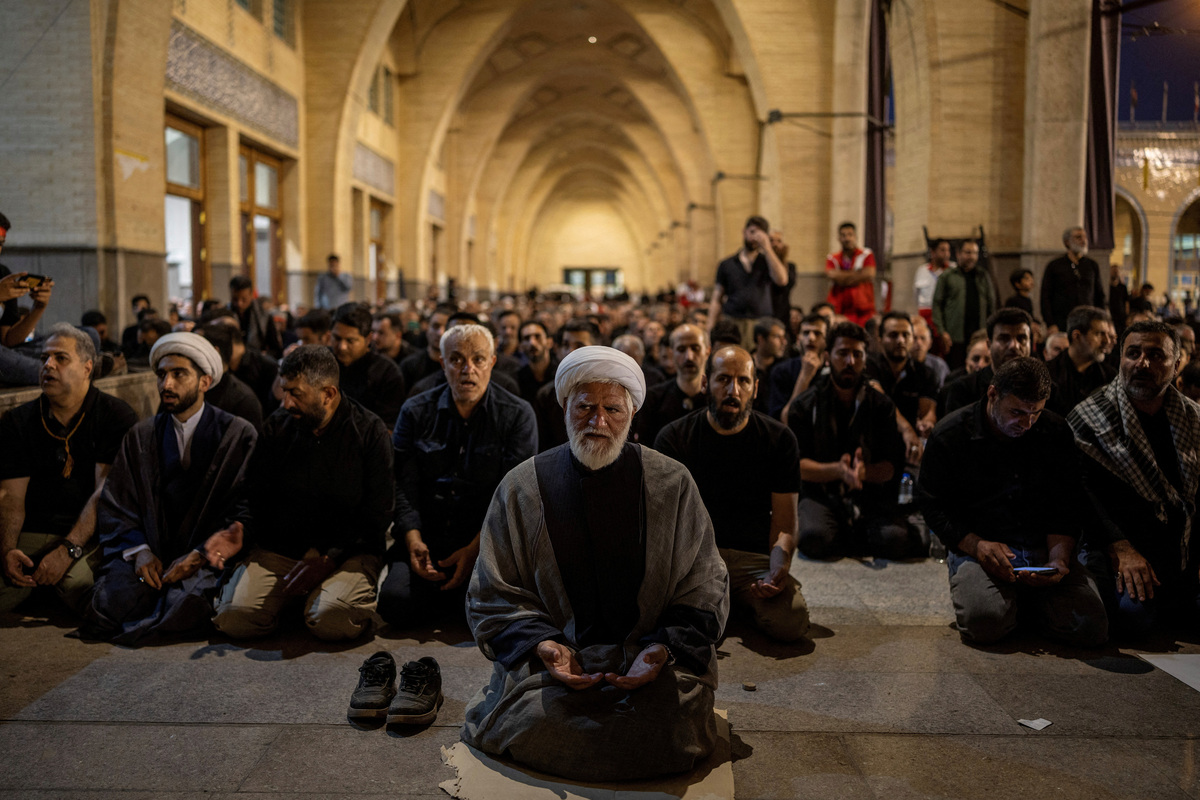 Mourners pray during a public farewell ceremony to pay their respects to late Supreme Leader Ayatollah Ali Khamenei, who was killed on February 28 in Israeli and U.S. airstrikes, at the Imam Khomeini Grand Mosalla, in Tehran, Iran July 4, 2026. REUTERS/Alkis Konstantinidis Foreign media in Iran operate under guidelines set by the Ministry of Culture and Islamic Guidance, which regulates press activity and permissions