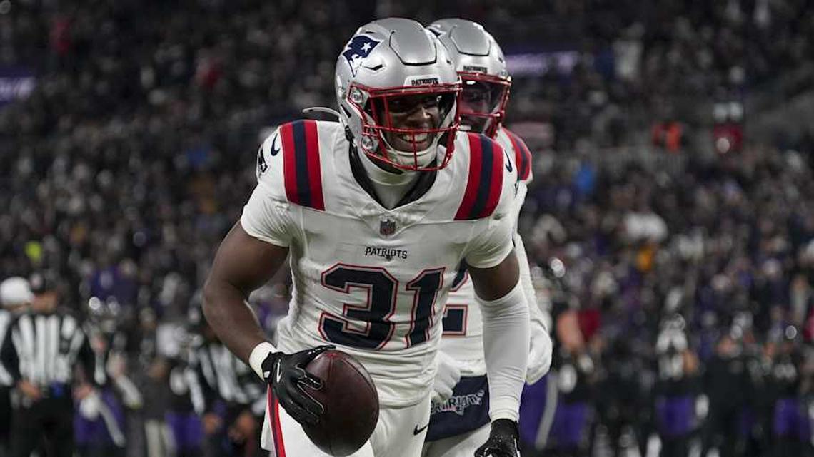  Dec 21, 2025; Baltimore, Maryland, USA; New England Patriots safety Craig Woodson (31) celebrates a Patriots recovering a fumble by Baltimore Ravens running back Derrick Henry (not pictured) during the first half of the game at M&T Bank Stadium. Mandatory Credit: James Lang-Imagn Images | James Lang-Imagn Images 