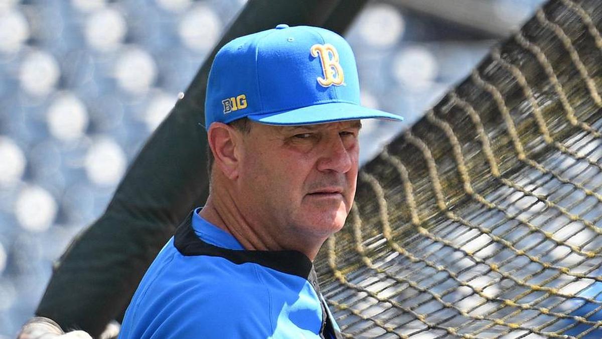  Jun 14, 2025; Omaha, Neb, USA; UCLA Bruins head coach John Savage watches the team warm up before the game against the Murray State Races at Charles Schwab Field. Mandatory Credit: Steven Branscombe-Imagn Images | Steven Branscombe-Imagn Images 