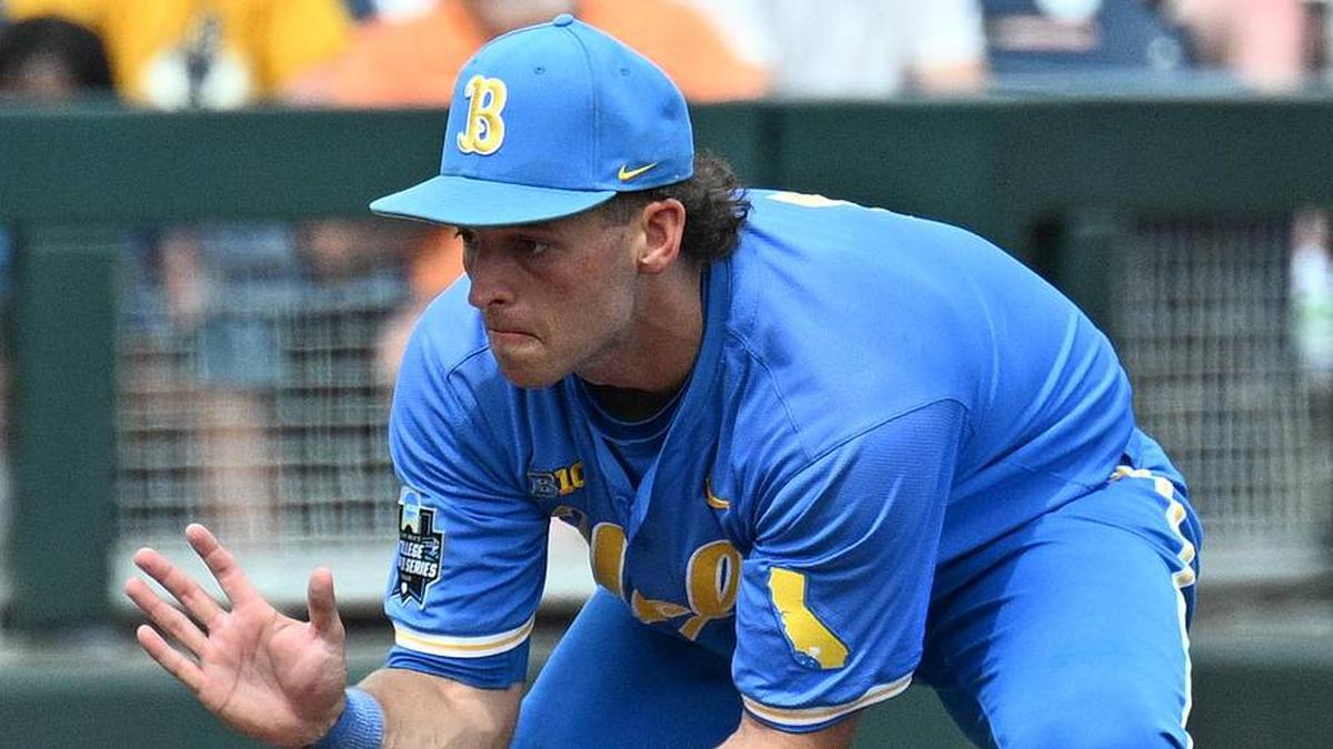  Jun 14, 2025; Omaha, Neb, USA; UCLA Bruins shortstop Roch Cholowsky (1) fields a ground ball against the Murray State Racers during the ninth inning at Charles Schwab Field. Mandatory Credit: Steven Branscombe-Imagn Images | Steven Branscombe-Imagn Images 