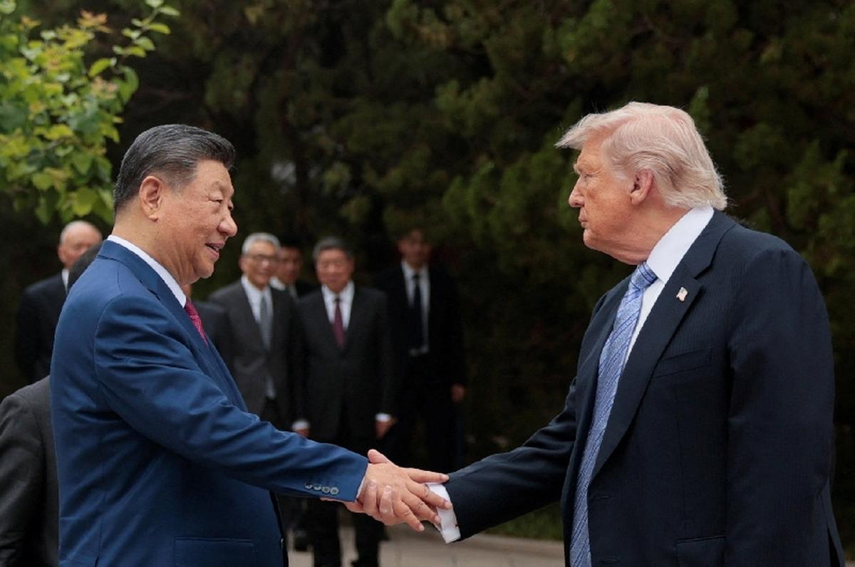 U.S. President Donald Trump shakes hands with Chinese President Xi Jinping while leaving after a visit to the Zhongnanhai Garden in Beijing, China, May 15, 2026. REUTERS/Evan Vucci/Pool