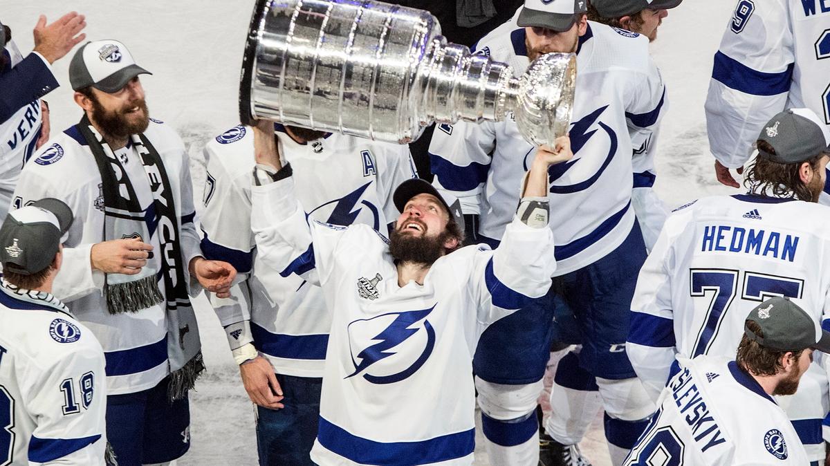 FILE - In this Sept. 28, 2020, file photo, Tampa Bay Lightning’s Nikita Kucherov (86) hoists the Stanley Cup after defeating the Dallas Stars in the NHL Stanley Cup hockey finals in Edmonton, Alberta. Kucherov is expected to miss the entire regular season because of a hip injury that requires surgery. General manager Julien BriseBois ruled out Kucherov for the 56-game season that begins Jan. 13 and ends May 8. (Jason Franson/The Canadian Press via AP, File)
