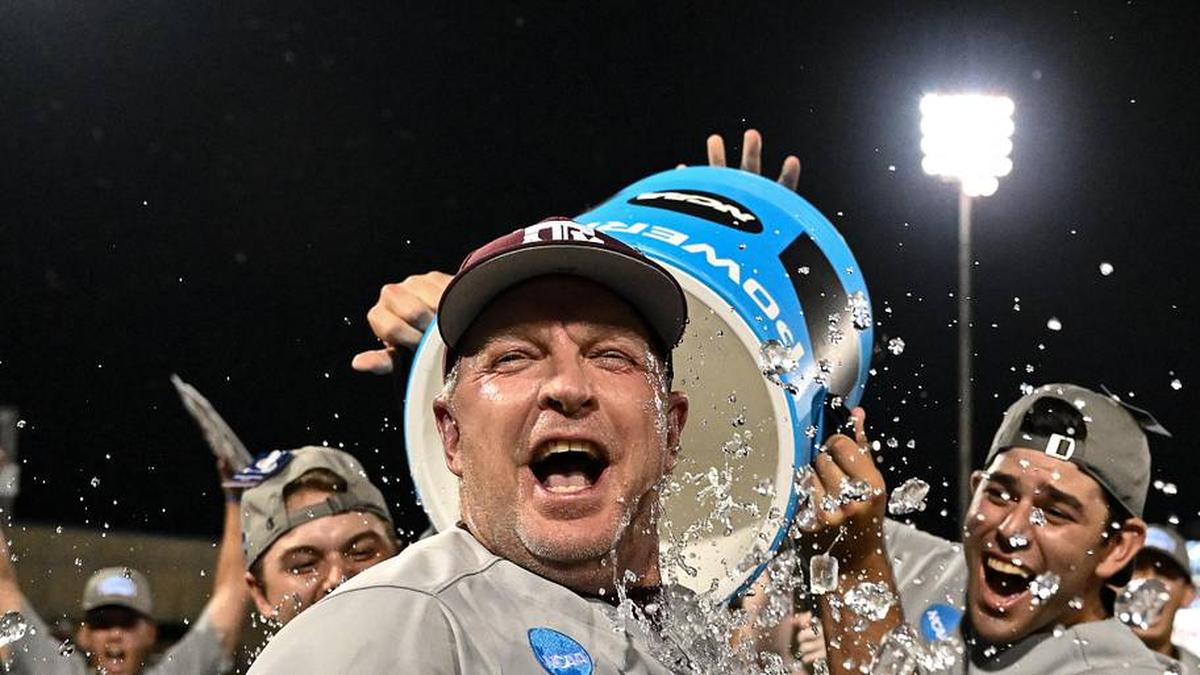  Jun 9, 2024; College Station, TX, USA; Texas A&M head coach Jim Schlossnagle celebrates after sweeping Oregon in the Bryan-College Station Super Regional series at Olsen Field, Blue Bell Park Mandatory Credit: Maria Lysaker-Imagn Images | Maria Lysaker-Imagn Images 