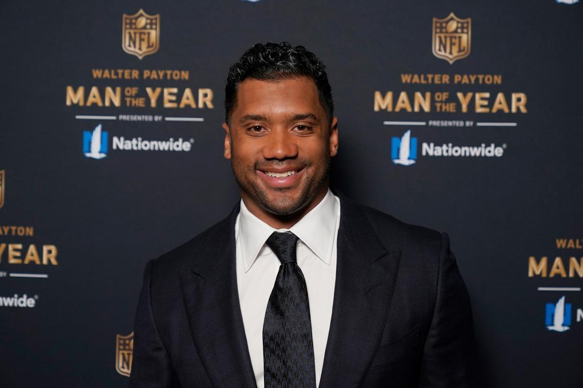 In this Friday, Feb. 5, 2021 file photo Seattle Seahawks quarterback Russell Wilson poses for a photo at the NFL Honors ceremony as part of Super Bowl 55 in Tampa, Fla. Wilson will return to N.C. State University, where he played football and baseball, this spring as a commencement speaker for the 2021 graduation ceremonies.